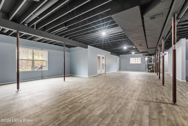 basement featuring hardwood / wood-style floors