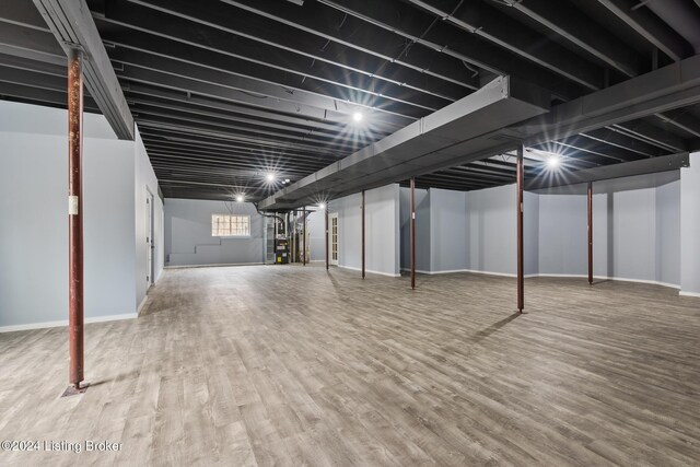 304 Hidden Falls Dr, Mt Washington, KY 40047 - below grade area with wood finished floors and baseboards
