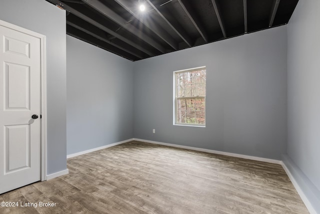 empty room featuring hardwood / wood-style flooring