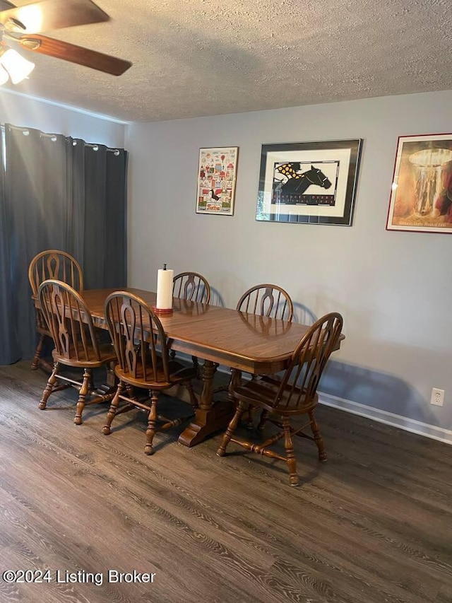 dining area featuring hardwood / wood-style floors, a textured ceiling, and ceiling fan