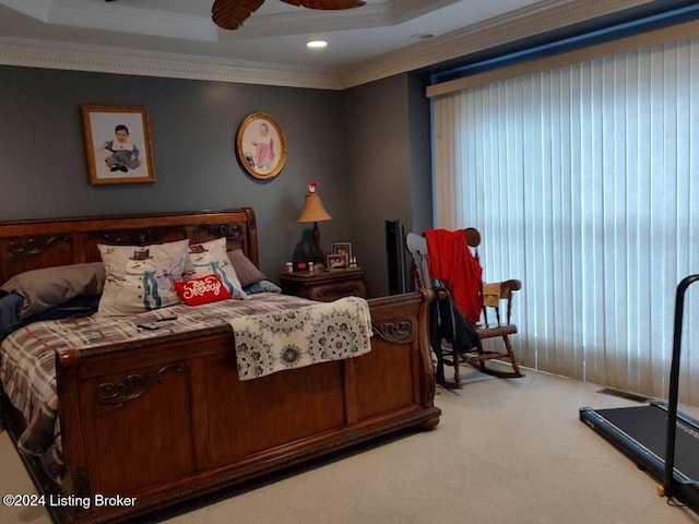 bedroom with ceiling fan, light colored carpet, and crown molding