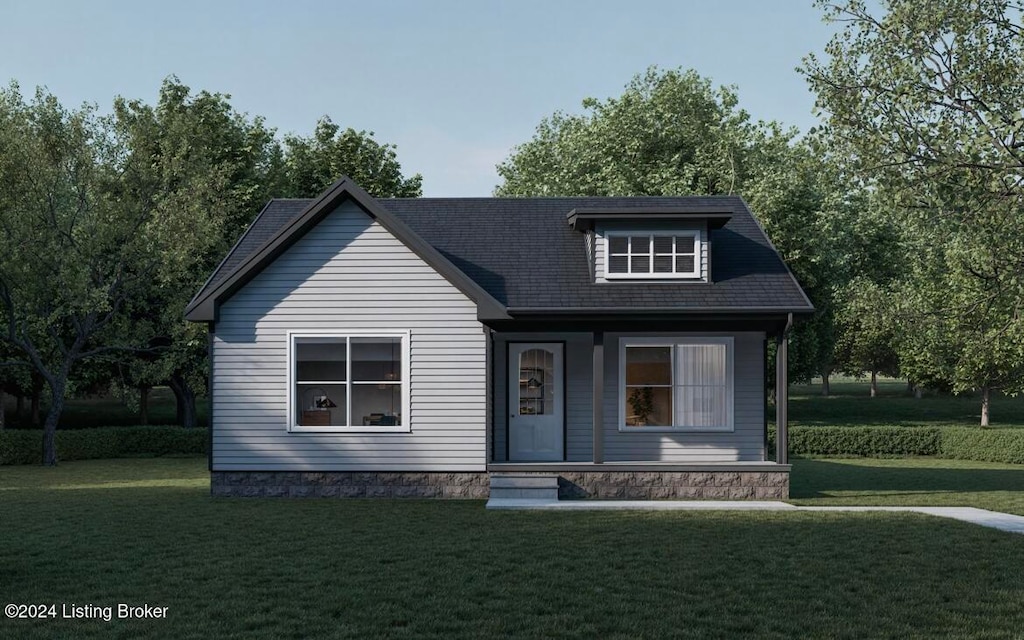 view of front facade featuring a porch and a front yard