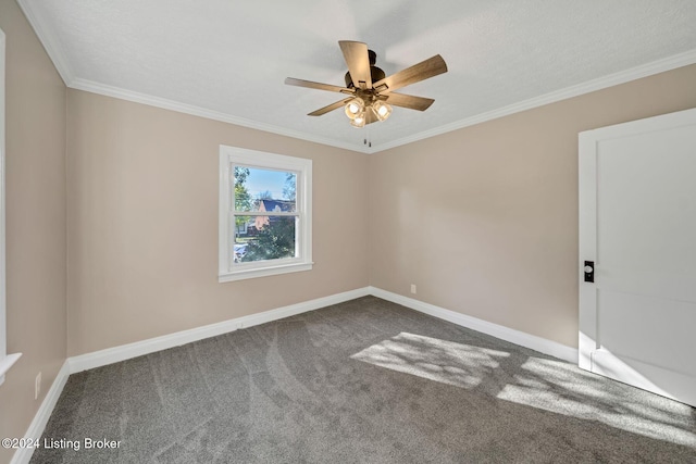 carpeted spare room with ornamental molding, a textured ceiling, and ceiling fan