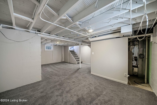 basement featuring carpet flooring