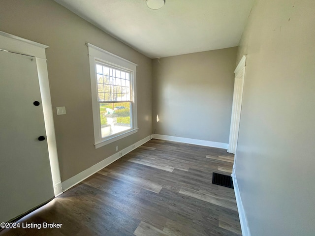 interior space with dark wood-type flooring