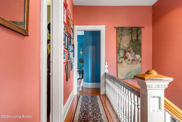 hallway featuring hardwood / wood-style flooring