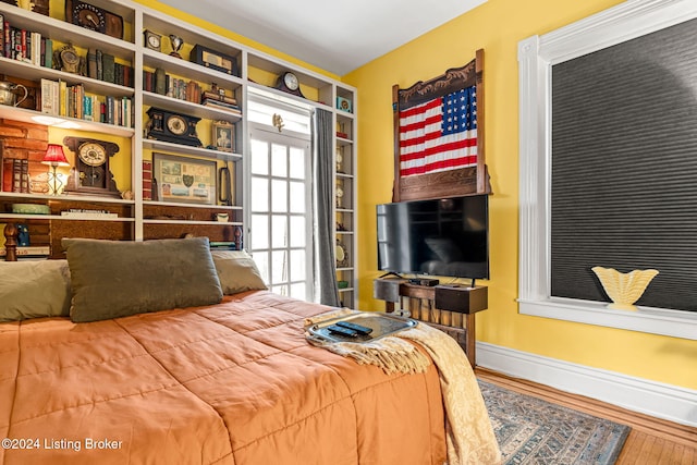 bedroom featuring hardwood / wood-style floors