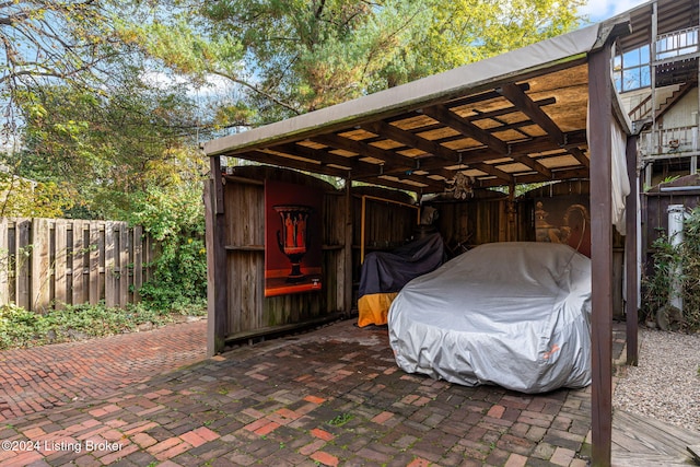 view of patio / terrace featuring a carport