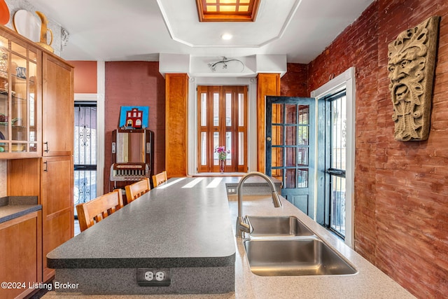 kitchen with a healthy amount of sunlight and sink