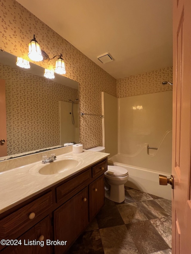 full bathroom featuring toilet, shower / tub combination, and vanity