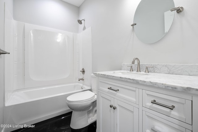 full bathroom featuring vanity, shower / washtub combination, and toilet