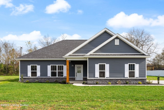 craftsman-style house with a front yard