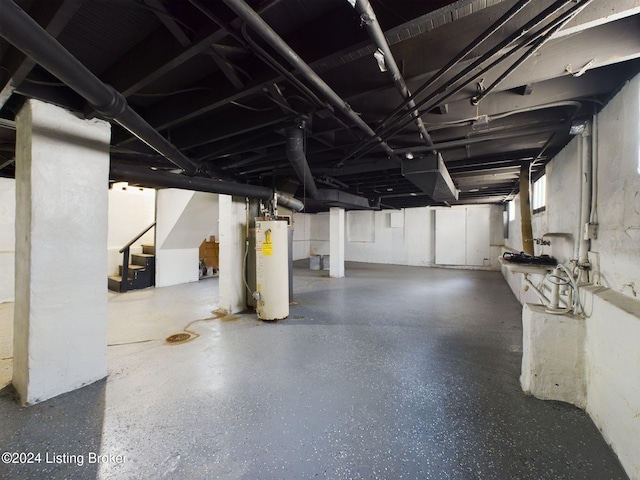 basement featuring gas water heater