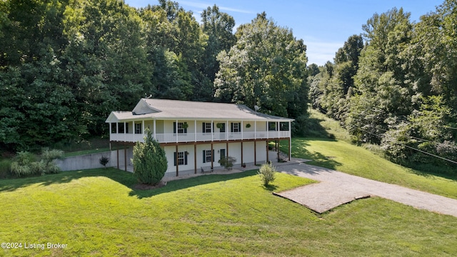 view of front facade featuring a front lawn and a garage