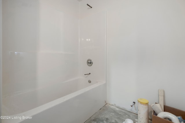 bathroom with concrete flooring