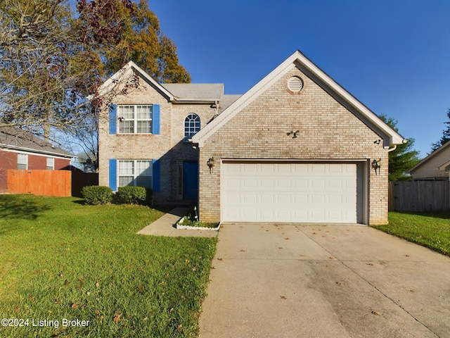 front facade with a garage and a front lawn