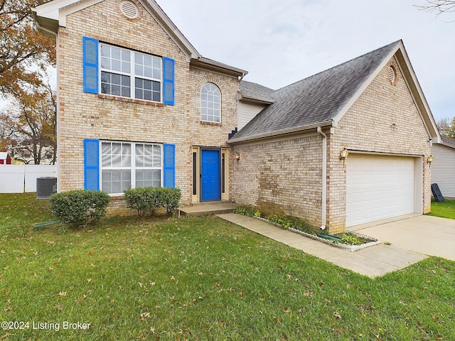 view of property with a front yard, a garage, and central AC unit