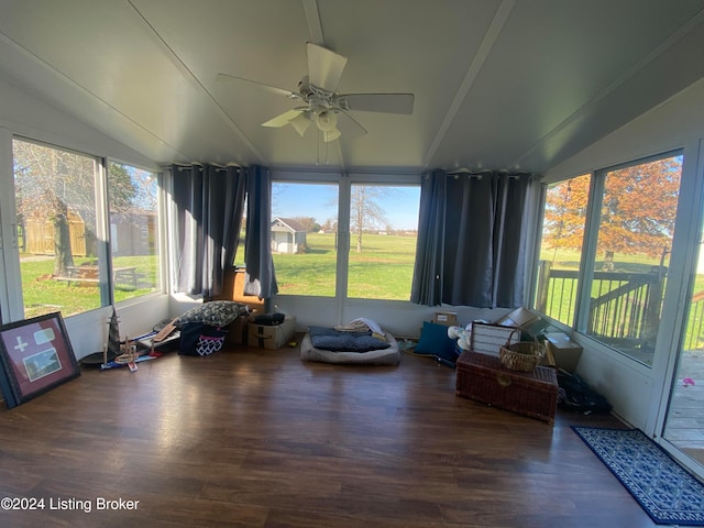 sunroom / solarium with vaulted ceiling and ceiling fan