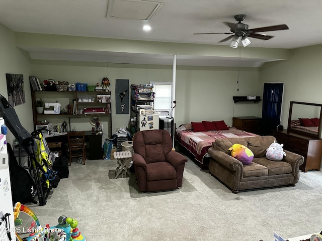 carpeted bedroom with ceiling fan