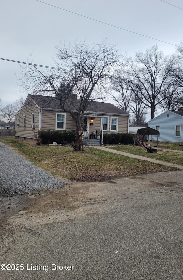 view of front of house with a carport