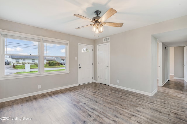 foyer featuring ceiling fan and light hardwood / wood-style flooring