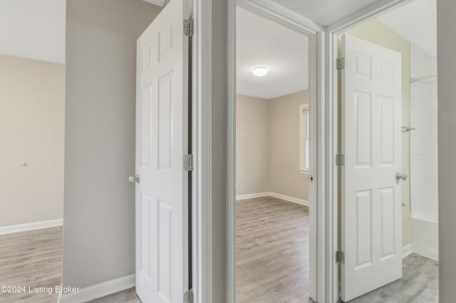 hall featuring light wood-type flooring