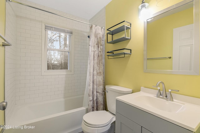 full bathroom with vanity, toilet, and shower / bathtub combination with curtain