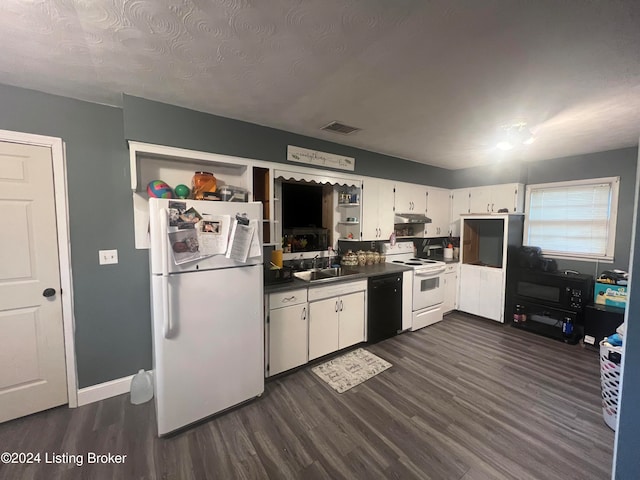 kitchen featuring white cabinetry, a textured ceiling, sink, dark wood-type flooring, and white appliances