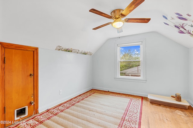 bonus room with ceiling fan, light hardwood / wood-style floors, and lofted ceiling