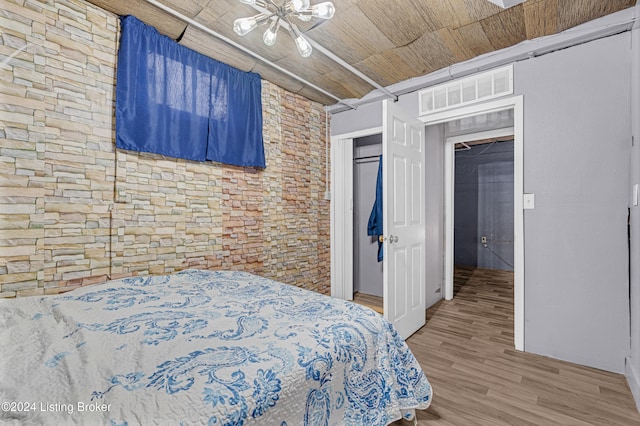 bedroom featuring hardwood / wood-style floors