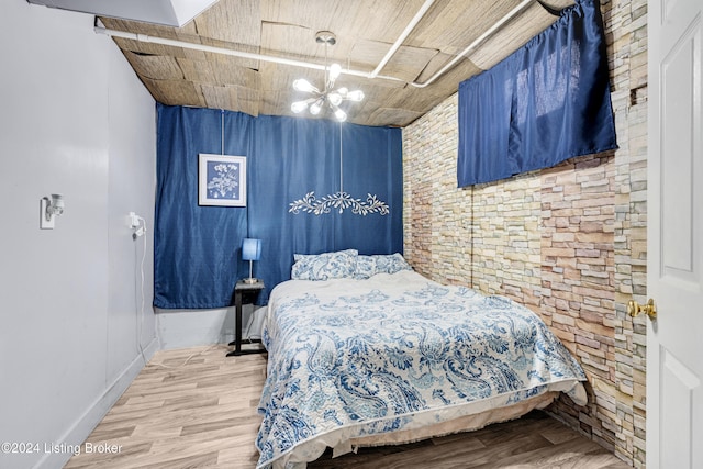 bedroom featuring wood-type flooring