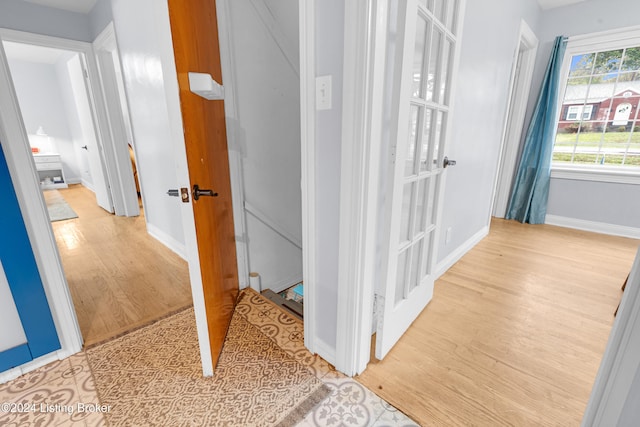 hall featuring light hardwood / wood-style floors