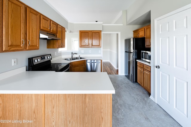 kitchen featuring kitchen peninsula, sink, and stainless steel appliances