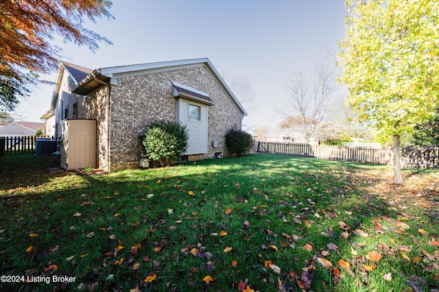 view of property exterior with a lawn