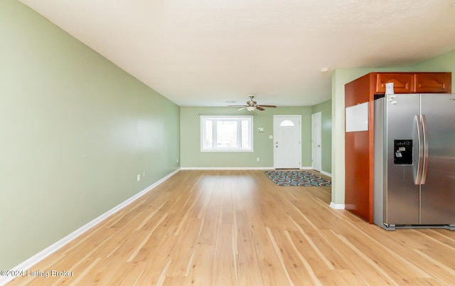 kitchen with ceiling fan, light hardwood / wood-style floors, and stainless steel refrigerator with ice dispenser