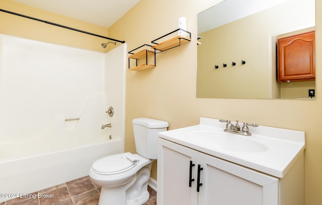 full bathroom featuring bathtub / shower combination, tile patterned floors, vanity, and toilet