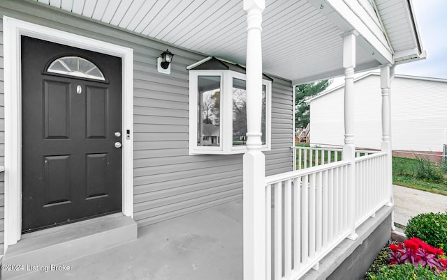 entrance to property with a porch