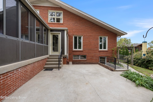 rear view of house with a patio area