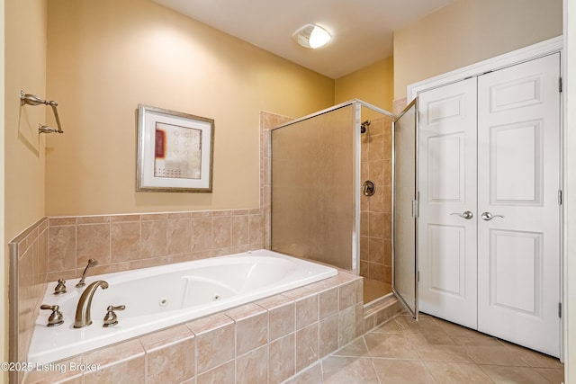 bathroom featuring shower with separate bathtub and tile patterned floors