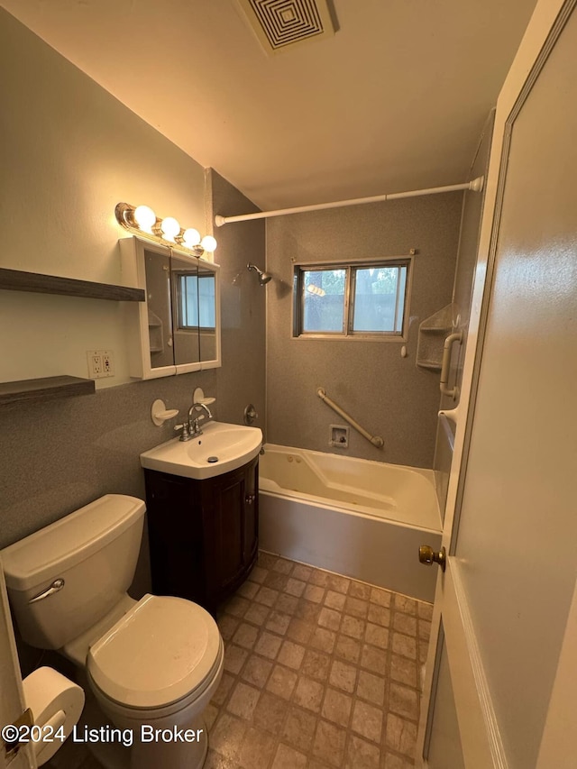 full bathroom featuring vanity,  shower combination, and toilet