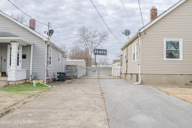 view of home's exterior featuring central AC unit