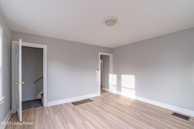 empty room featuring light wood-type flooring