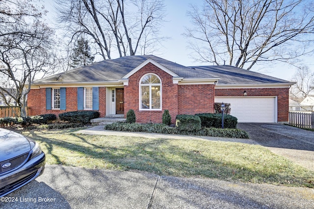 ranch-style house featuring a front lawn