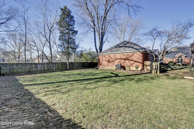 view of yard featuring central AC