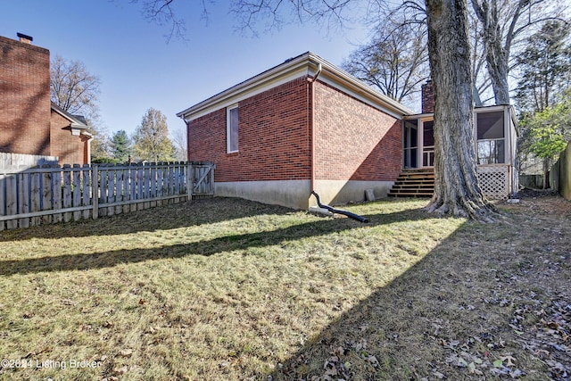 view of home's exterior featuring a lawn