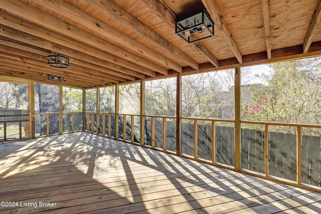 unfurnished sunroom featuring a healthy amount of sunlight