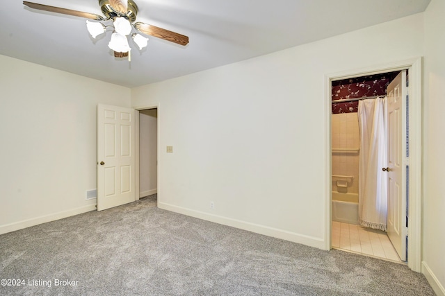 carpeted empty room with ceiling fan