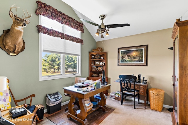 home office featuring vaulted ceiling, ceiling fan, and light wood-type flooring