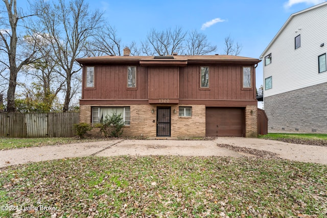 view of front of property featuring a garage