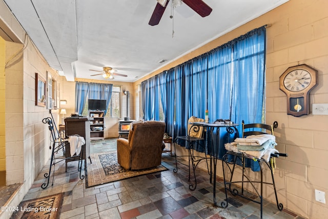 living room featuring ceiling fan